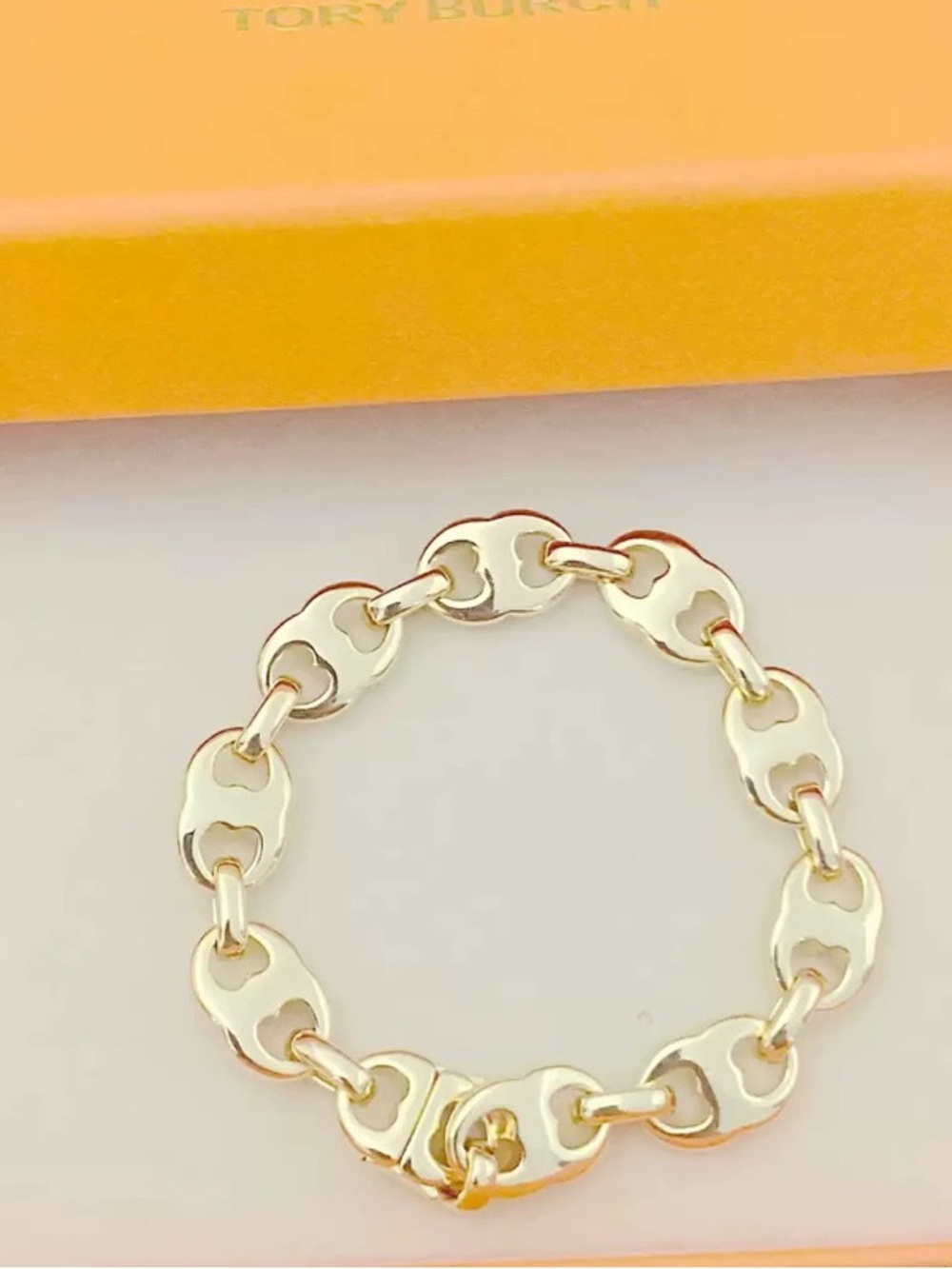 Tory Burch Gold Tone Linked Logo Bracelet